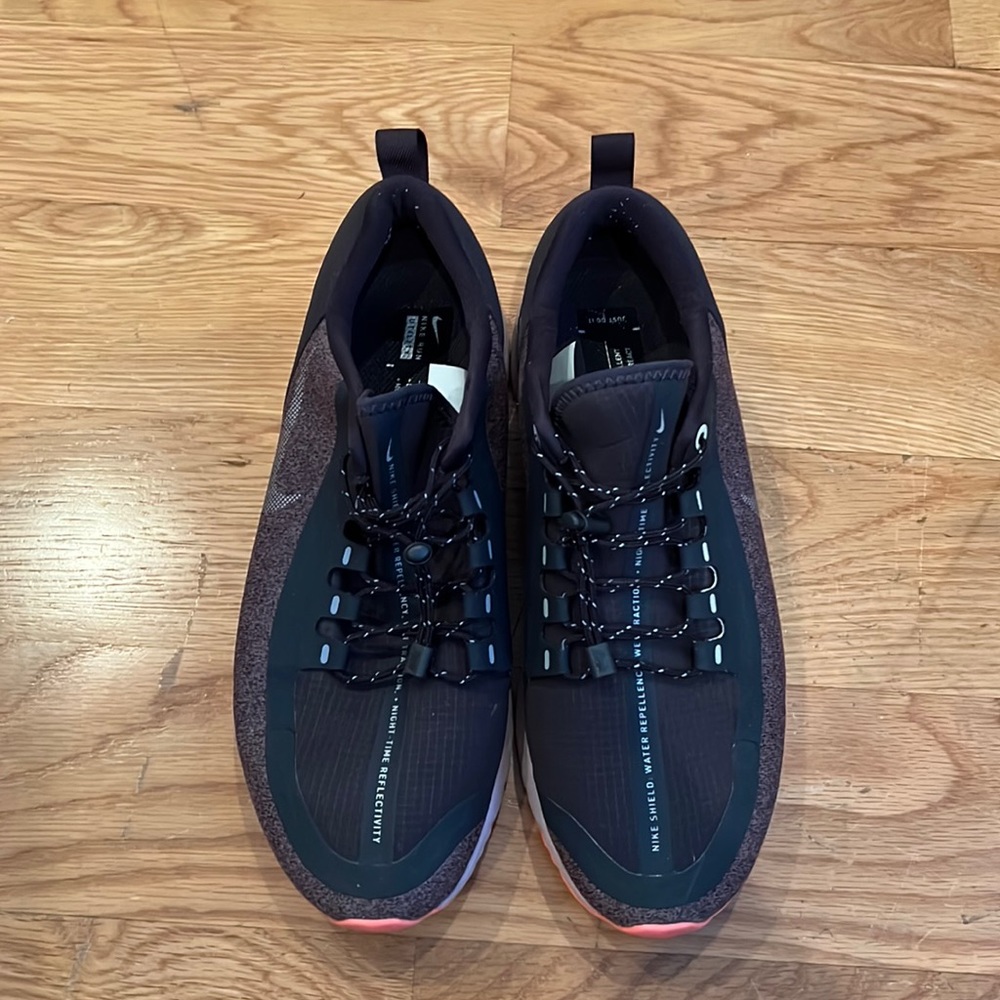Nike shield water repellent running shoes
